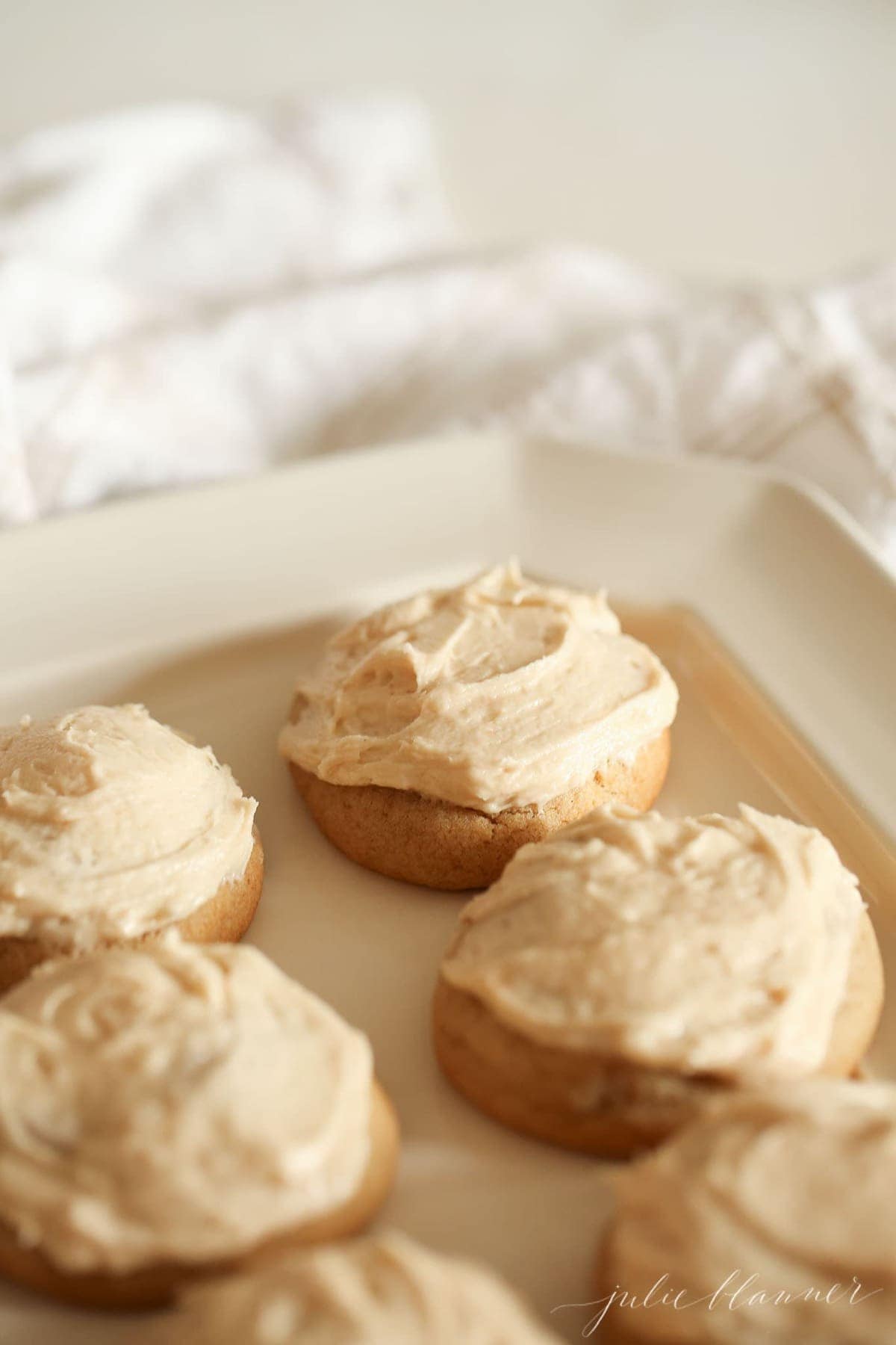 Close up of frosted cookies on a plate