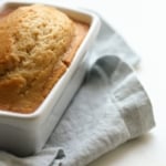Brown sugar quick bread in a white ceramic loaf pan