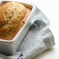 Brown sugar quick bread in a white ceramic loaf pan