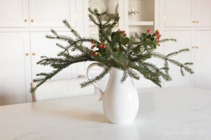 Christmas flowers in a pitcher