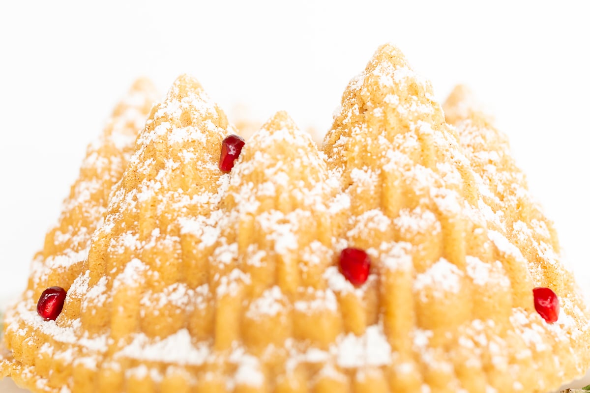 A delicious cinnamon pound cake, with a satisfying dusting of powdered sugar.