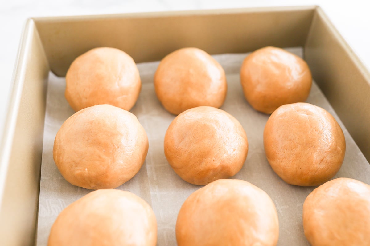 A box of stuffed peanut butter cookies sitting on top of a marble counter.