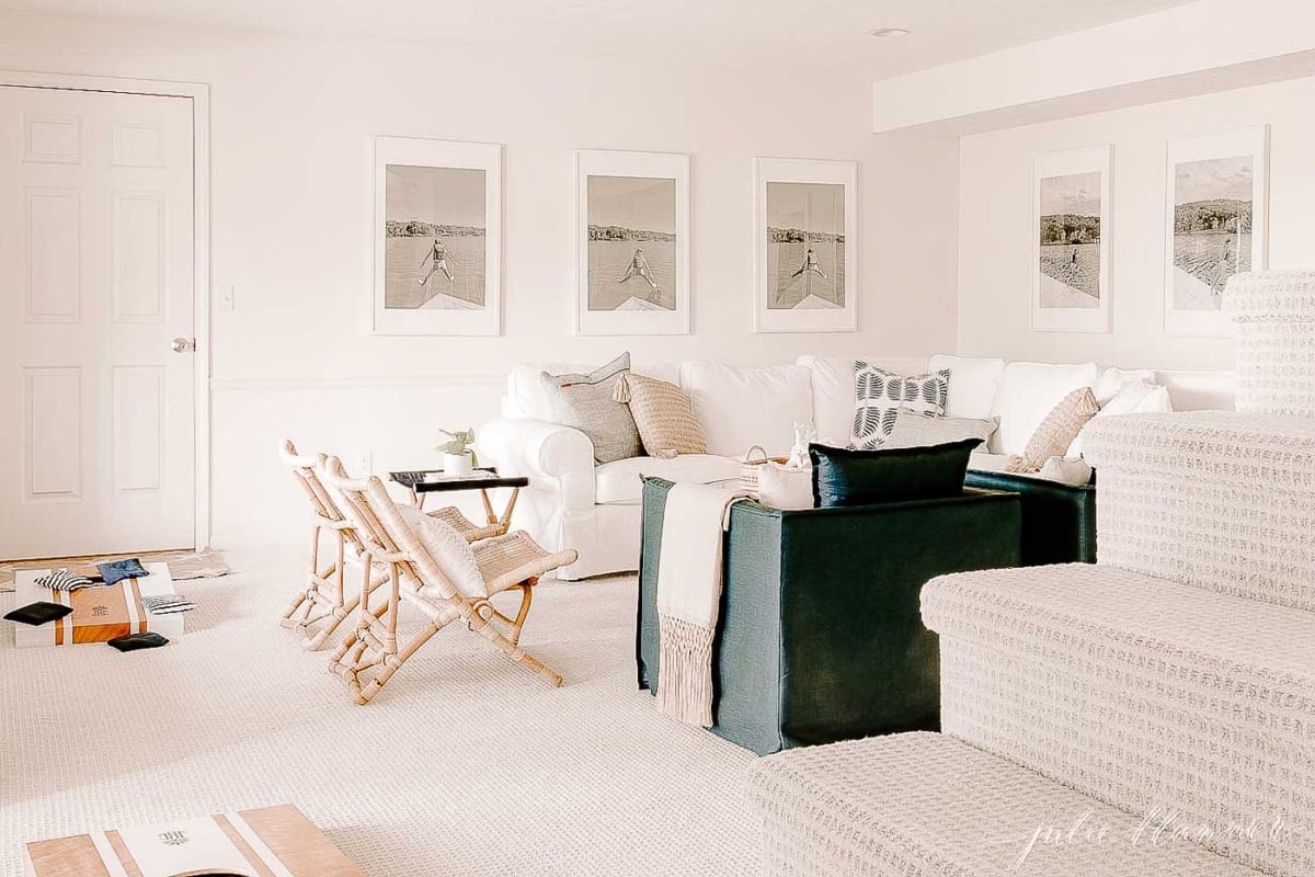 A white couch in a living room, with Farrow and Ball White Tie paint color on the walls.