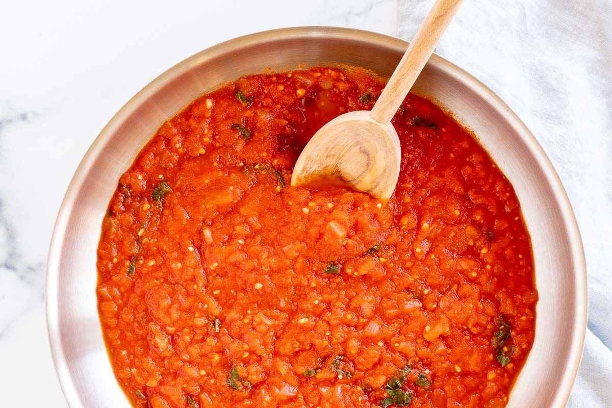 A silver saucepan full of pomodoro sauce