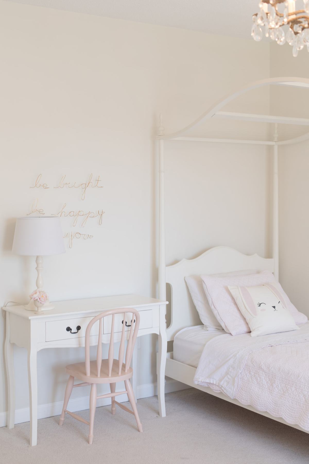 easter decor in a little girl's room including a cute pink bunny pillow.