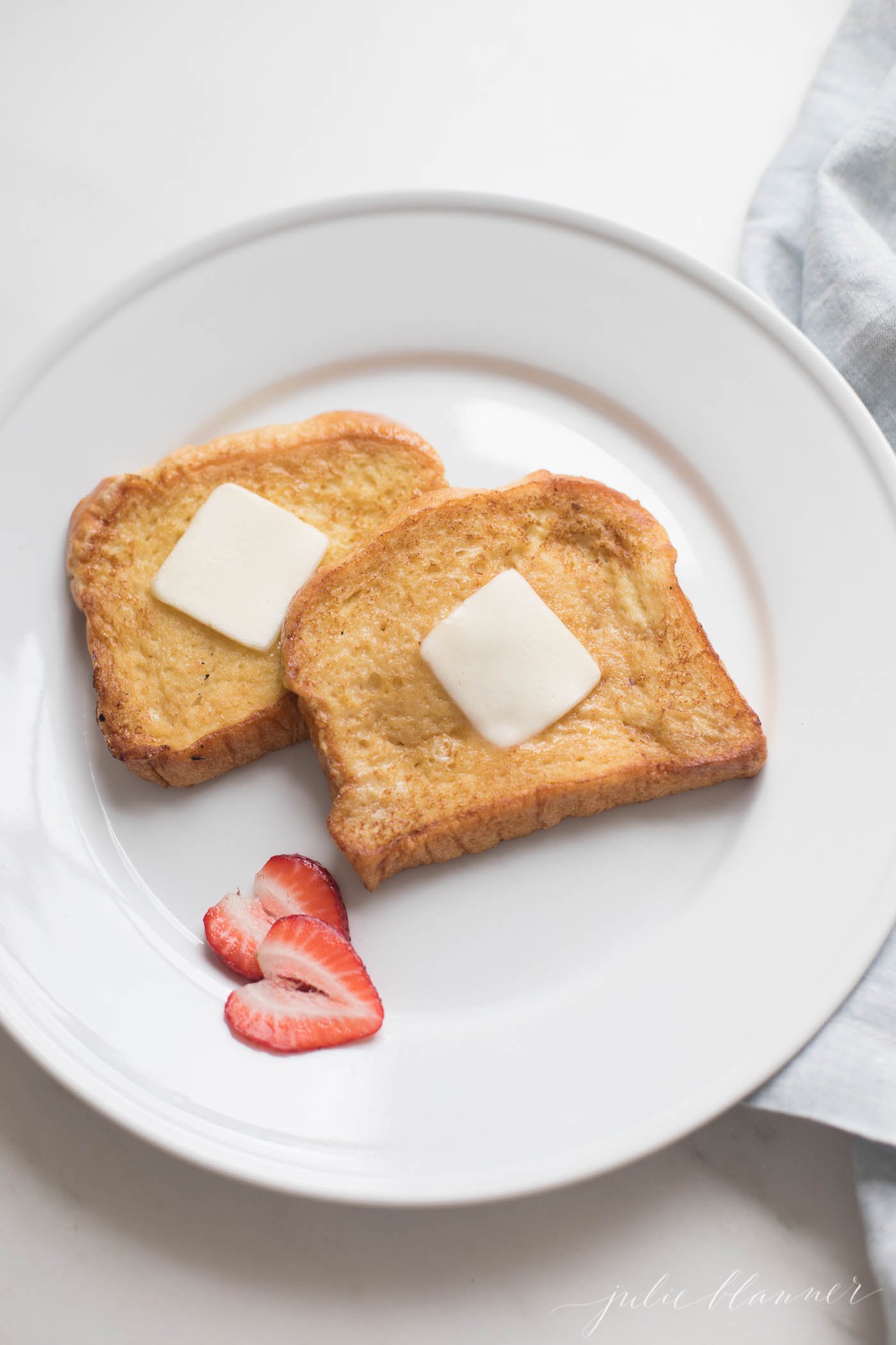 You wouldn't know by tasting it, but this is an incredibly Easy French Toast Recipe that is full of flavor. Get the secrets that make this easy French Toast so amazing!