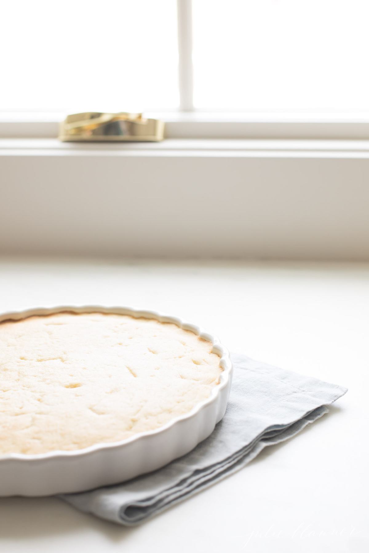 The baked sugar cookie crust cooling after baking