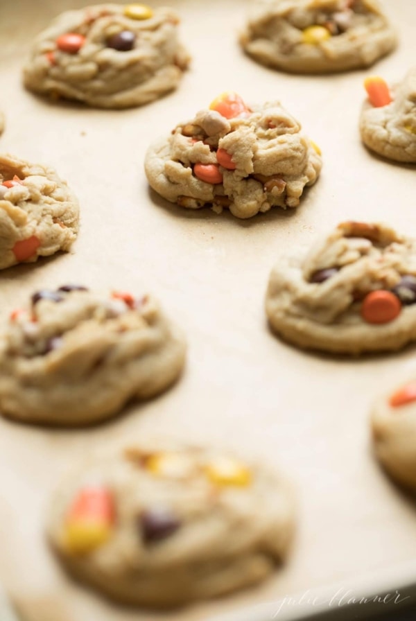 thick halloween monster cookies on a baking sheet