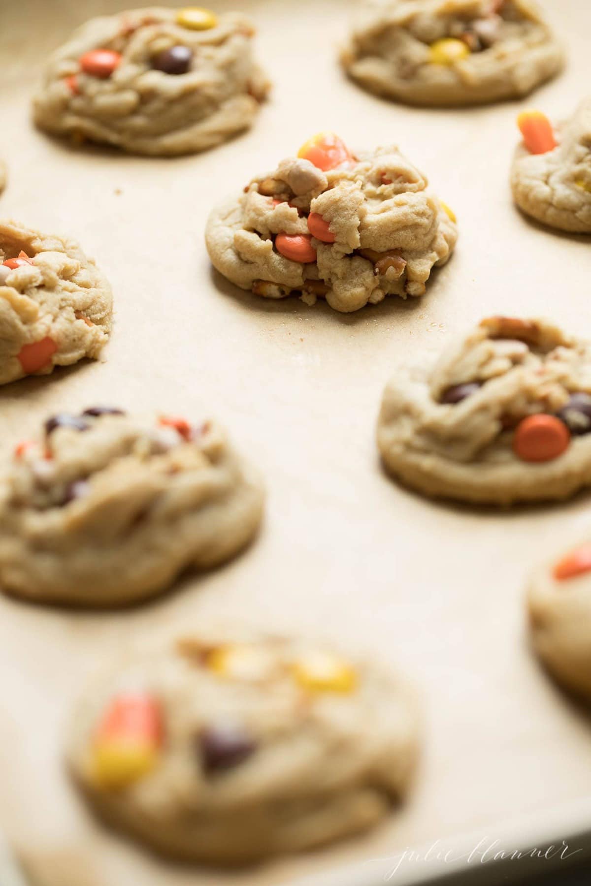 thick halloween monster cookies on a baking sheet