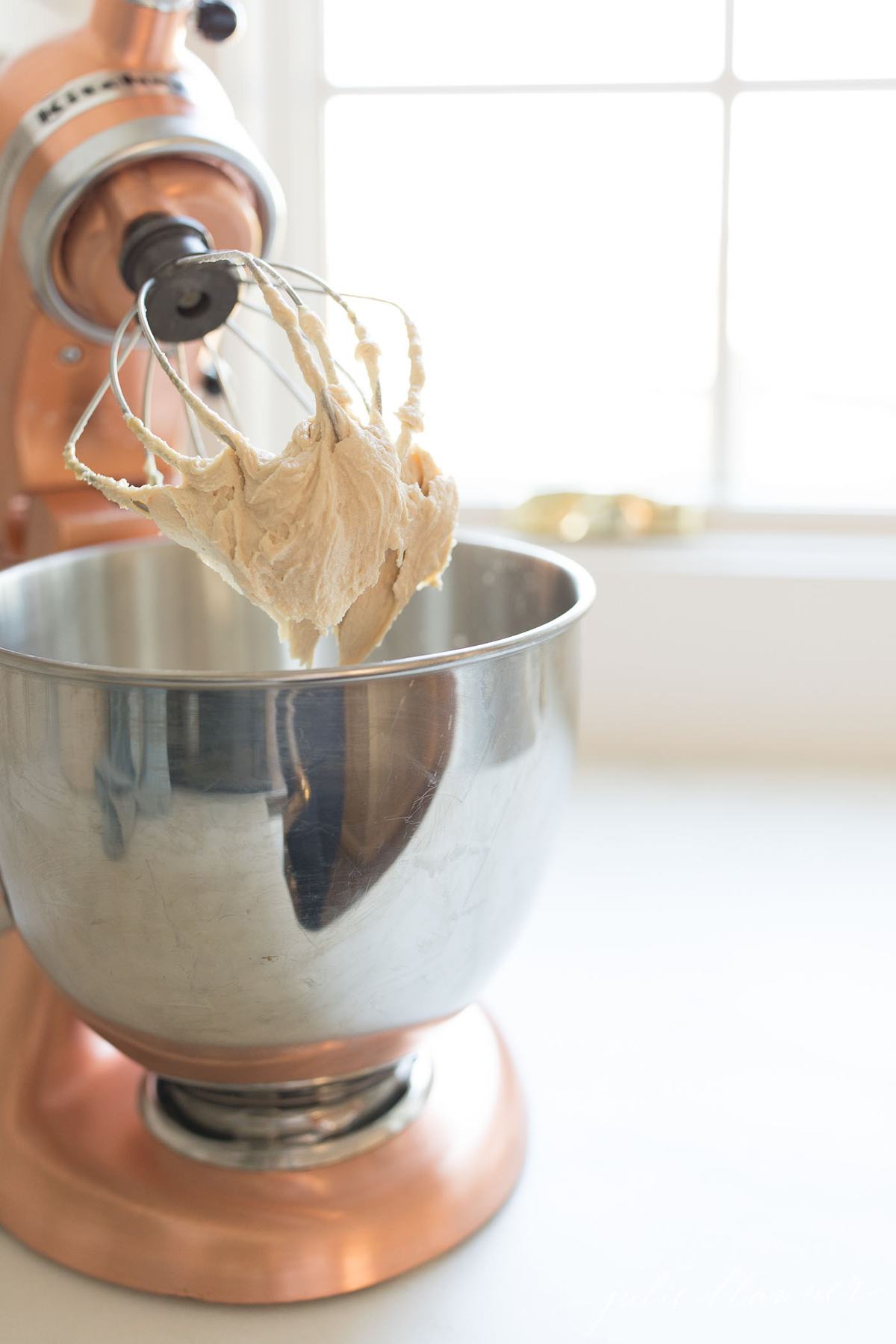 buttercream caramel icing in a stand mixer