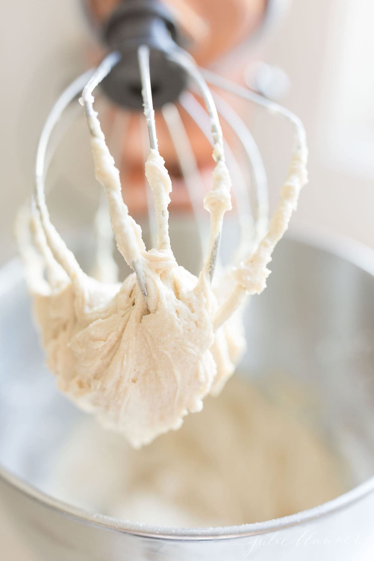 mixed caramel frosting on a beater