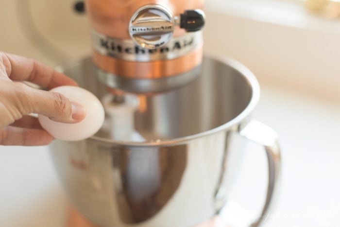 An egg going into the mixer