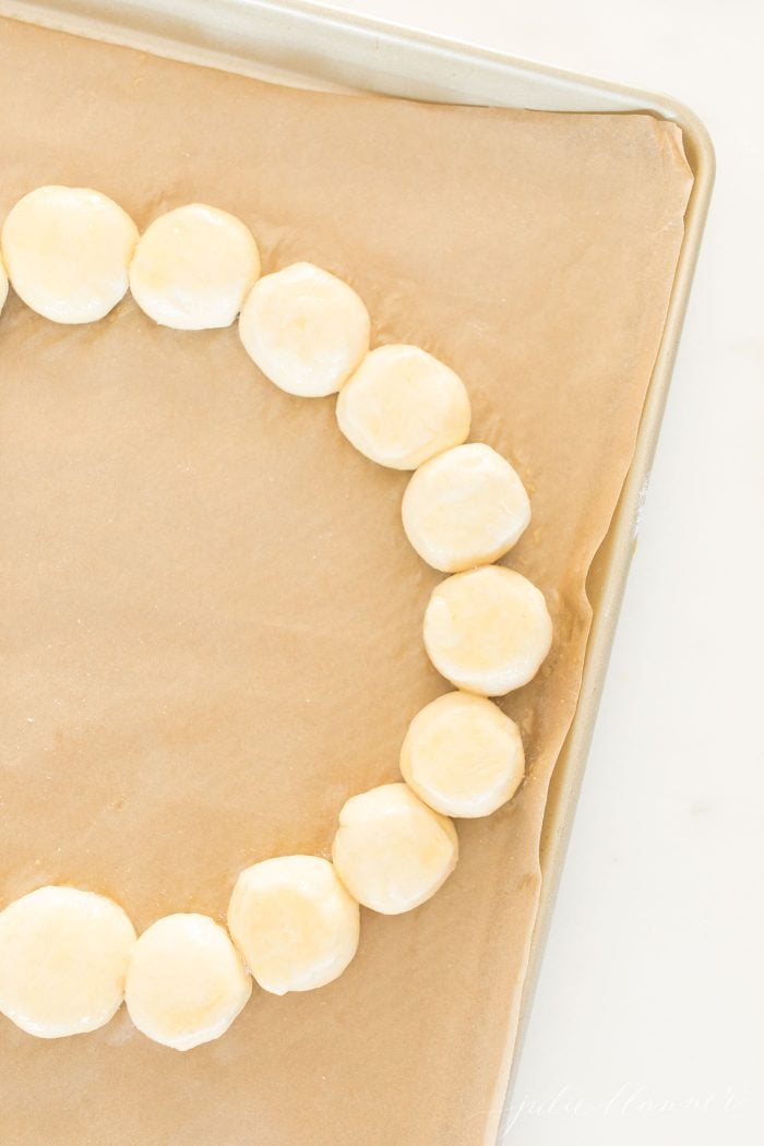 The brie and pastry balls forming the shape of a wreath