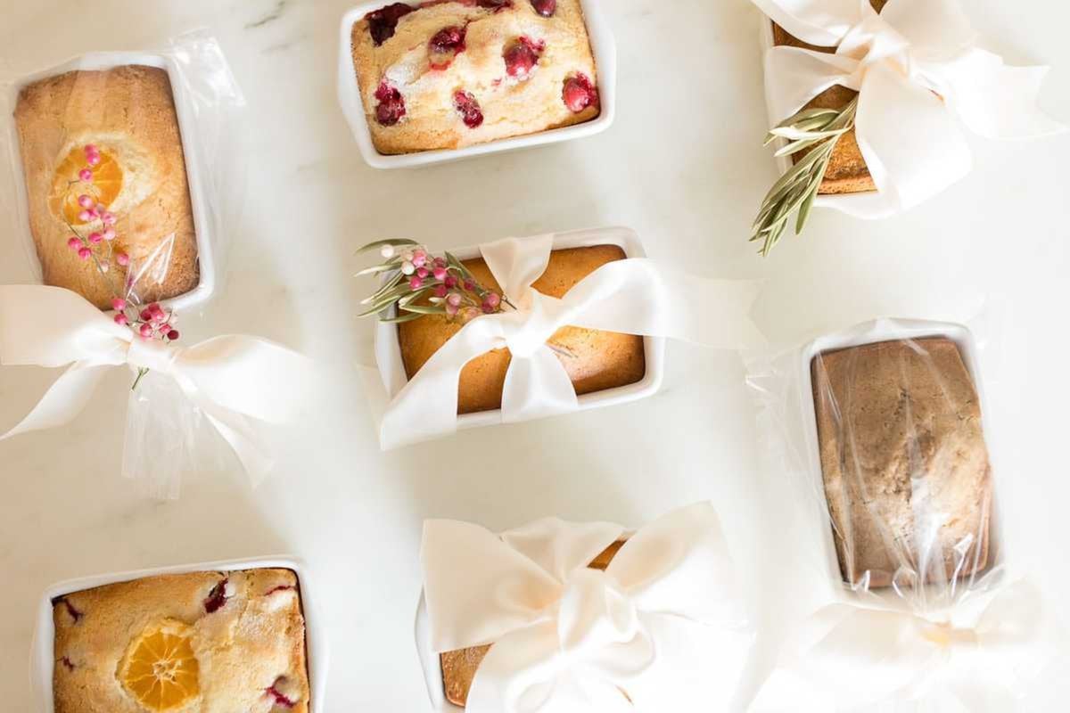 A variety of miniature quick bread loaves wrapped up for the holidays.