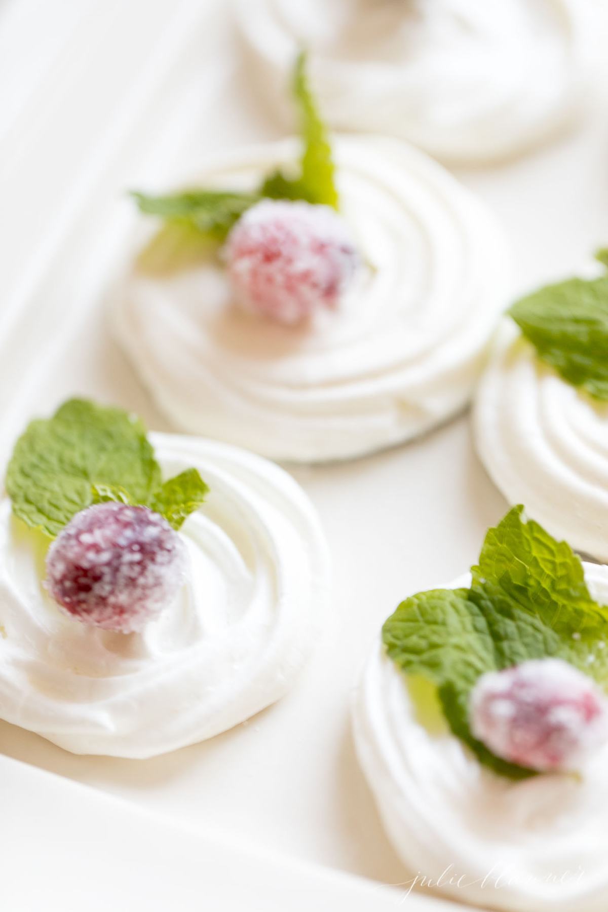 Decorated meringues on a serving tray