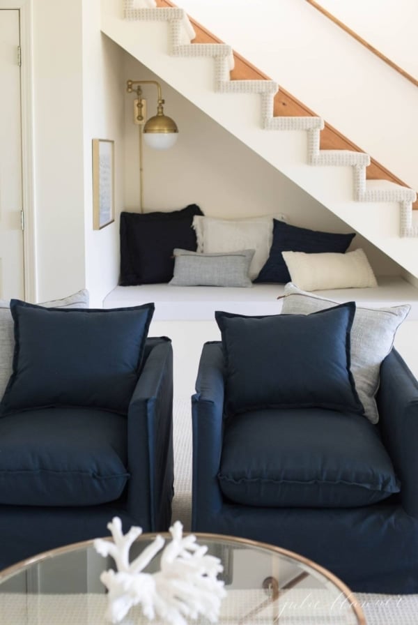 open staircase with kids reading nook