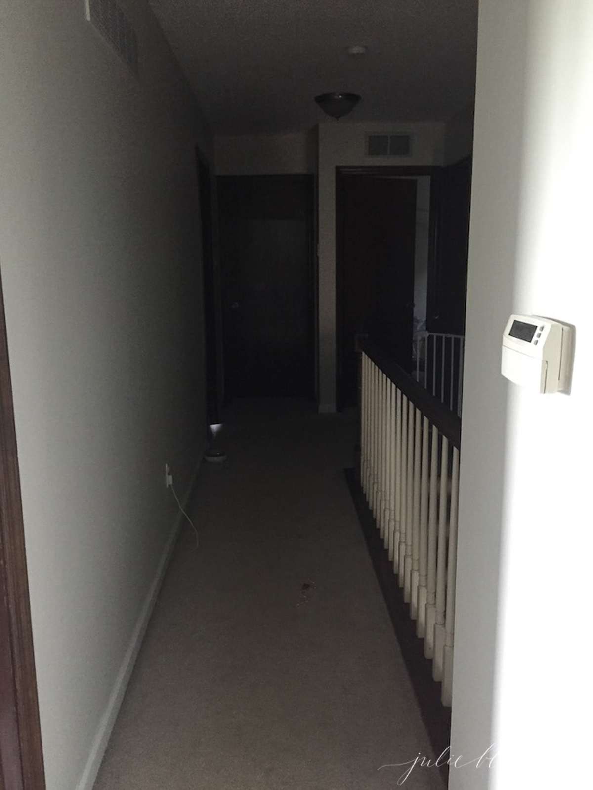 Dated and dark hallway in a vintage home