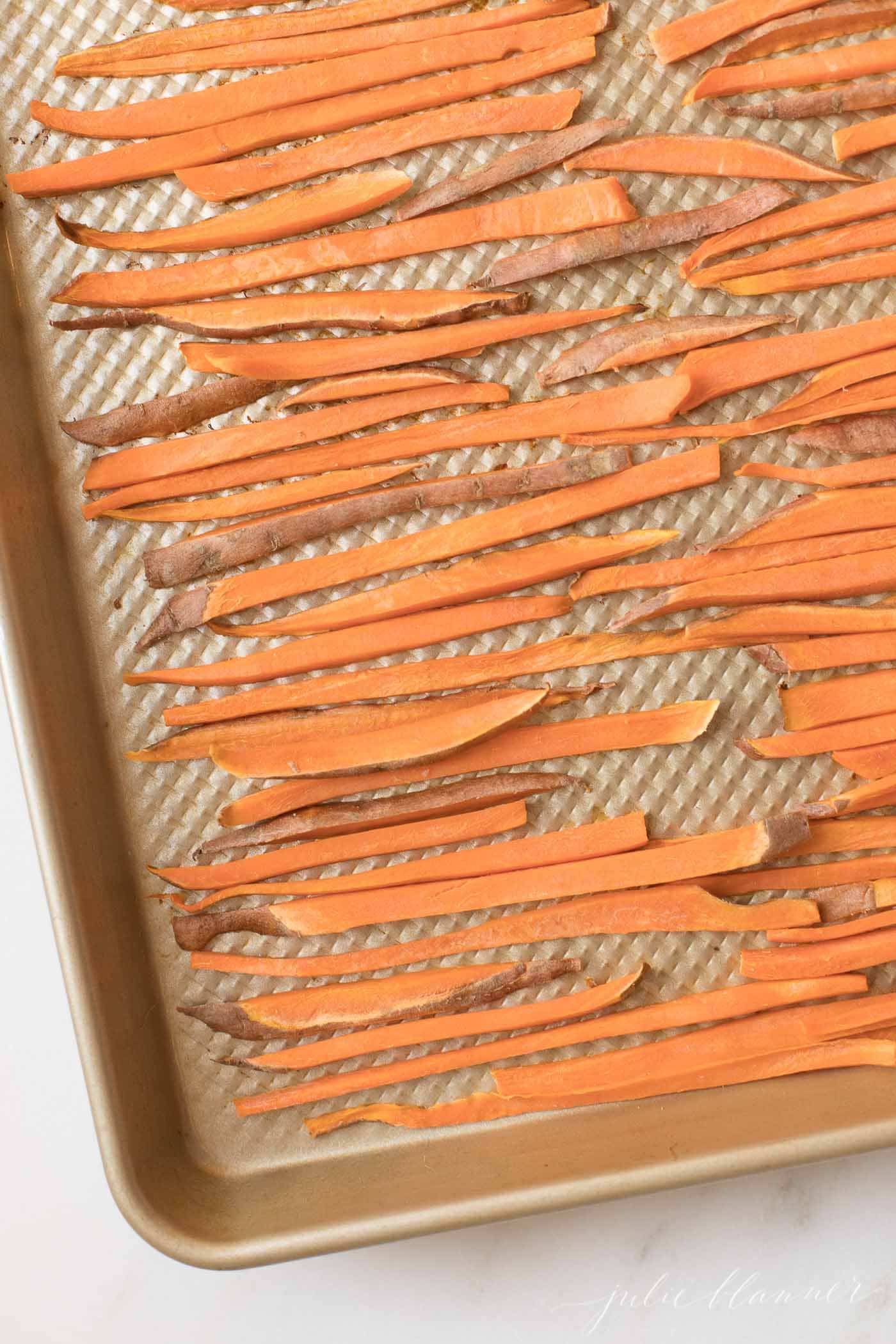 sweet potato fries on a sheet pan