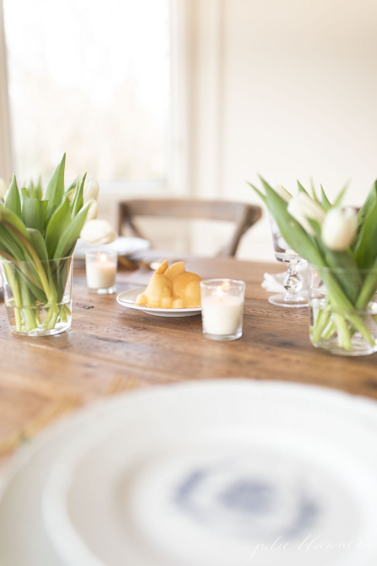 easter table setting and bunny cake centerpiece