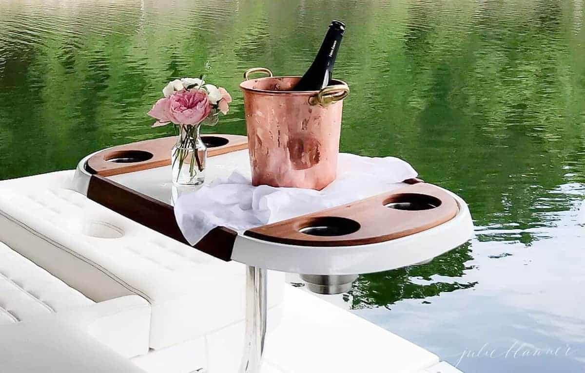 champagne bucket on table on back of boat