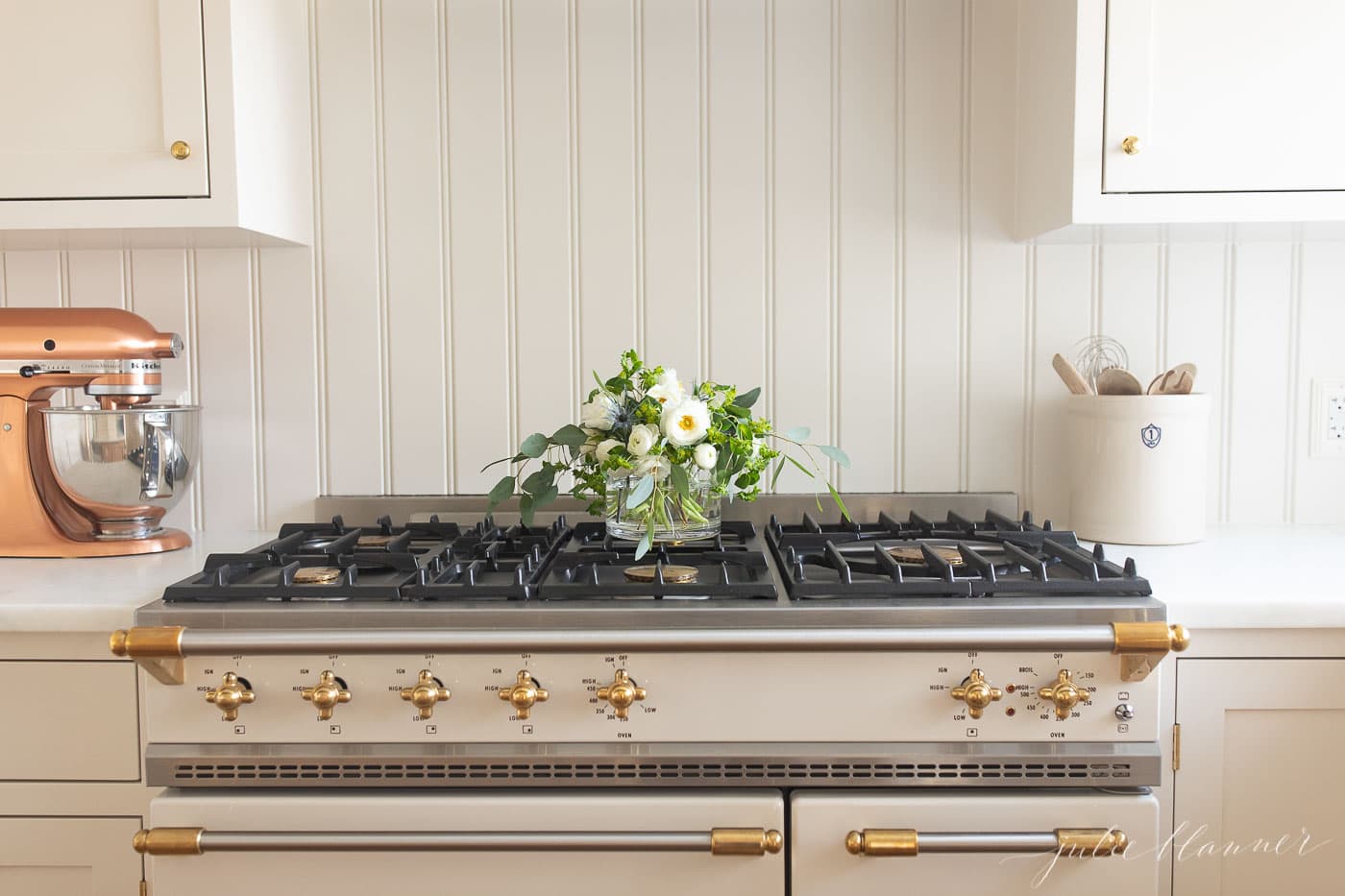 A stove top oven sitting inside of a kitchen