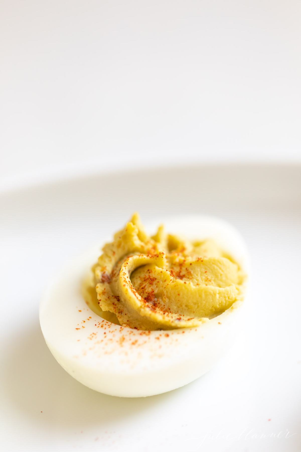 avocado deviled egg with paprika