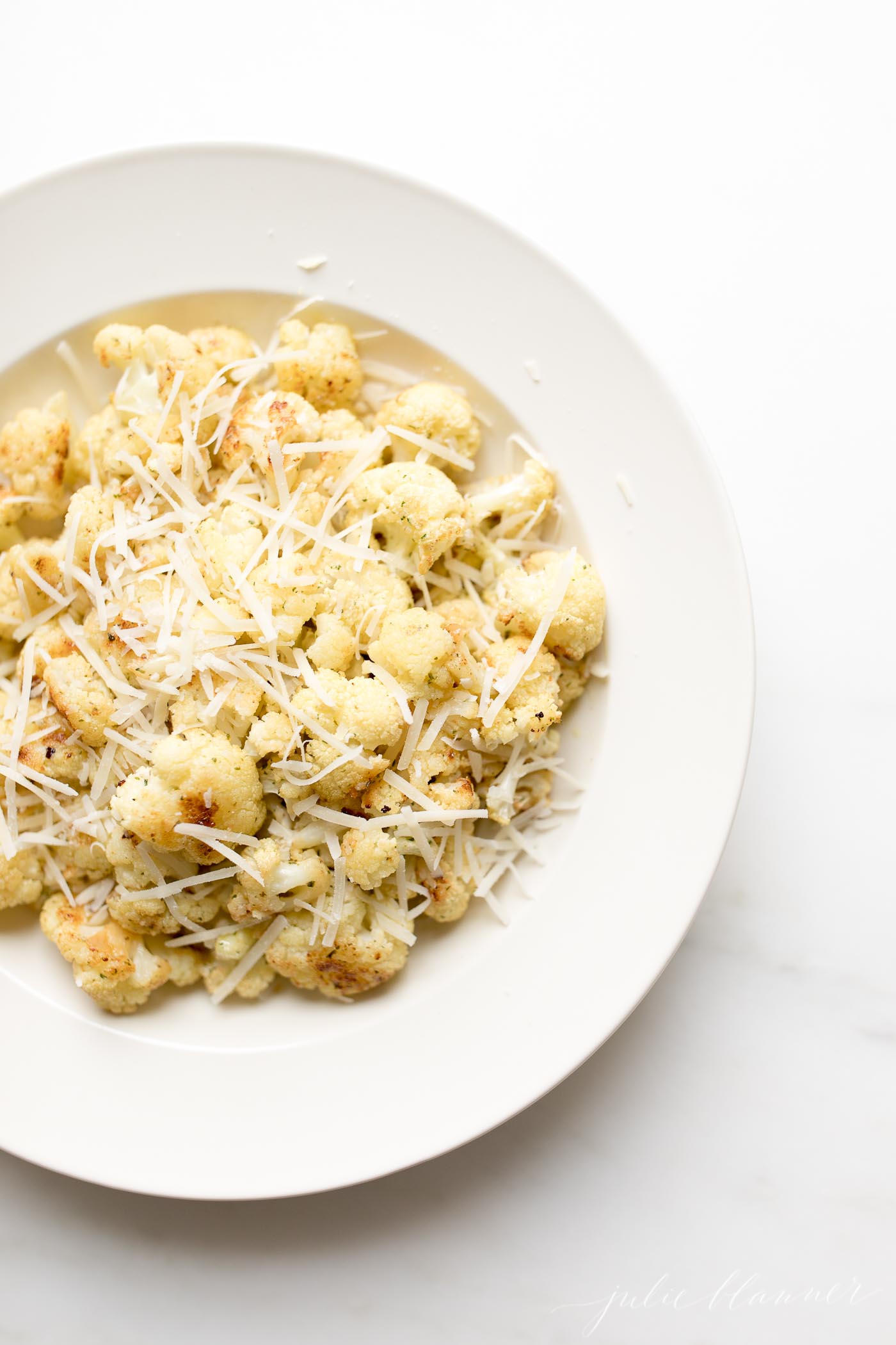 baked cauliflower with parmesan and ranch in a serving bowl