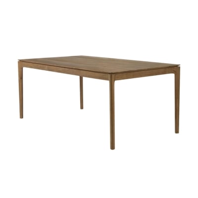 A teak dining table with a wooden top.