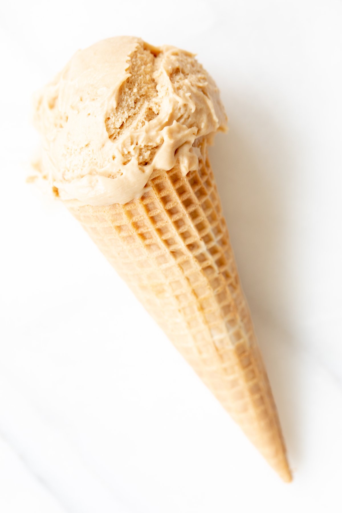 No churn cookie butter ice cream in a waffle cone.