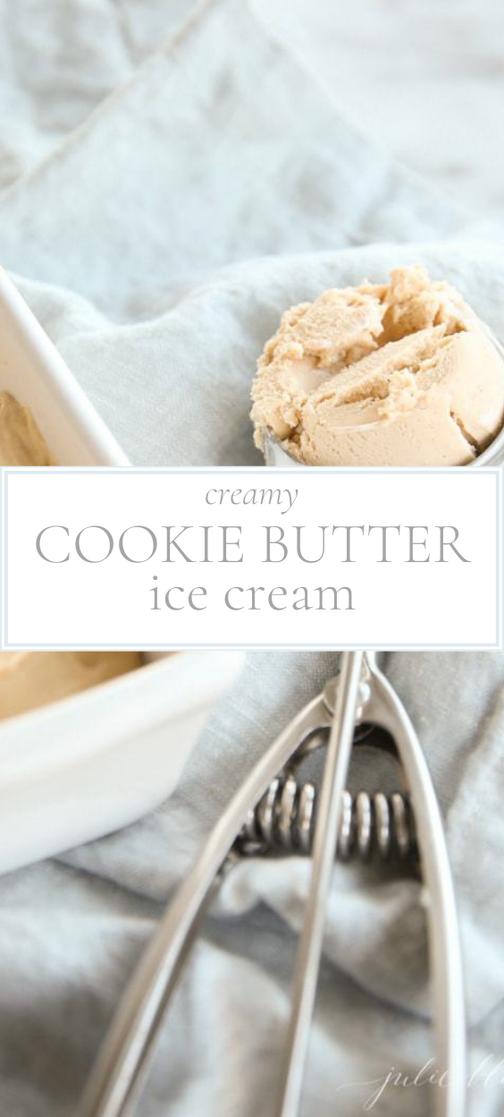 One-third of a white loaf pan containing cookie butter ice cream. To the left of the pan is a scooper holding a scoop of cookie butter ice cream.