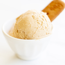 A white bowl full of homemade cookie butter ice cream.