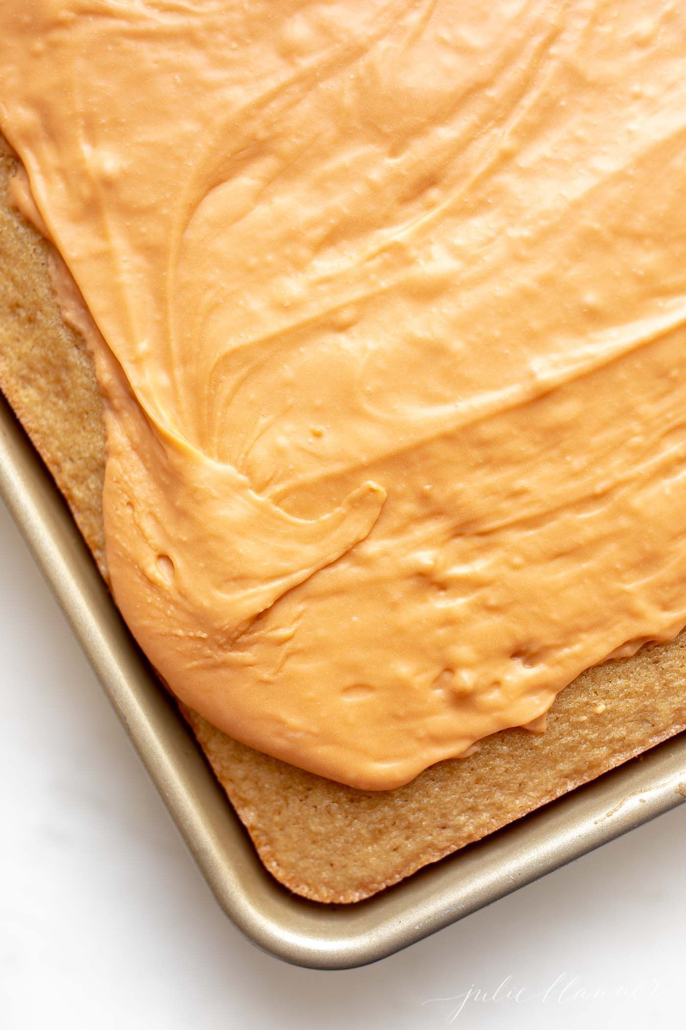 A butterscotch cake in a half sheet pan.