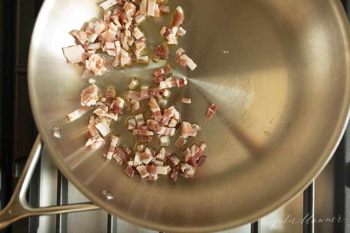 Aluminum pan on the stovetop, fresh pancetta waiting to be cooked.