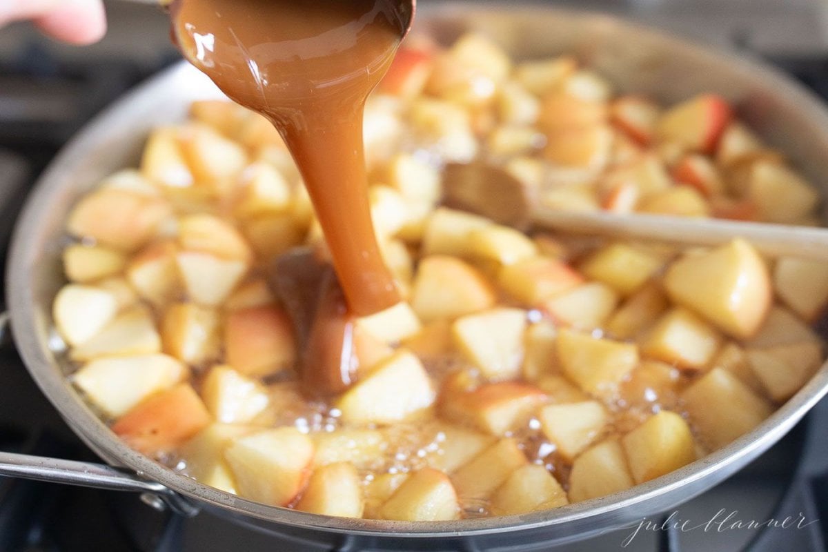 Apple crisp topping cooking in a pan on a stovetop