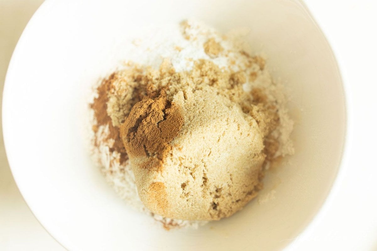 Brown sugar and other ingredients in a white bowl