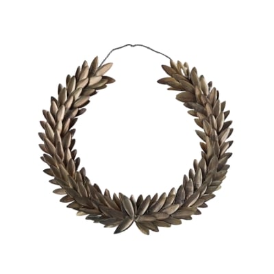 A laurel wreath hanging on a white background.