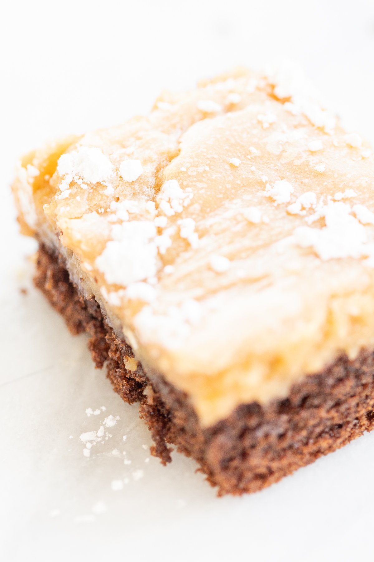 A slice of peanut butter ooey gooey butter cake.