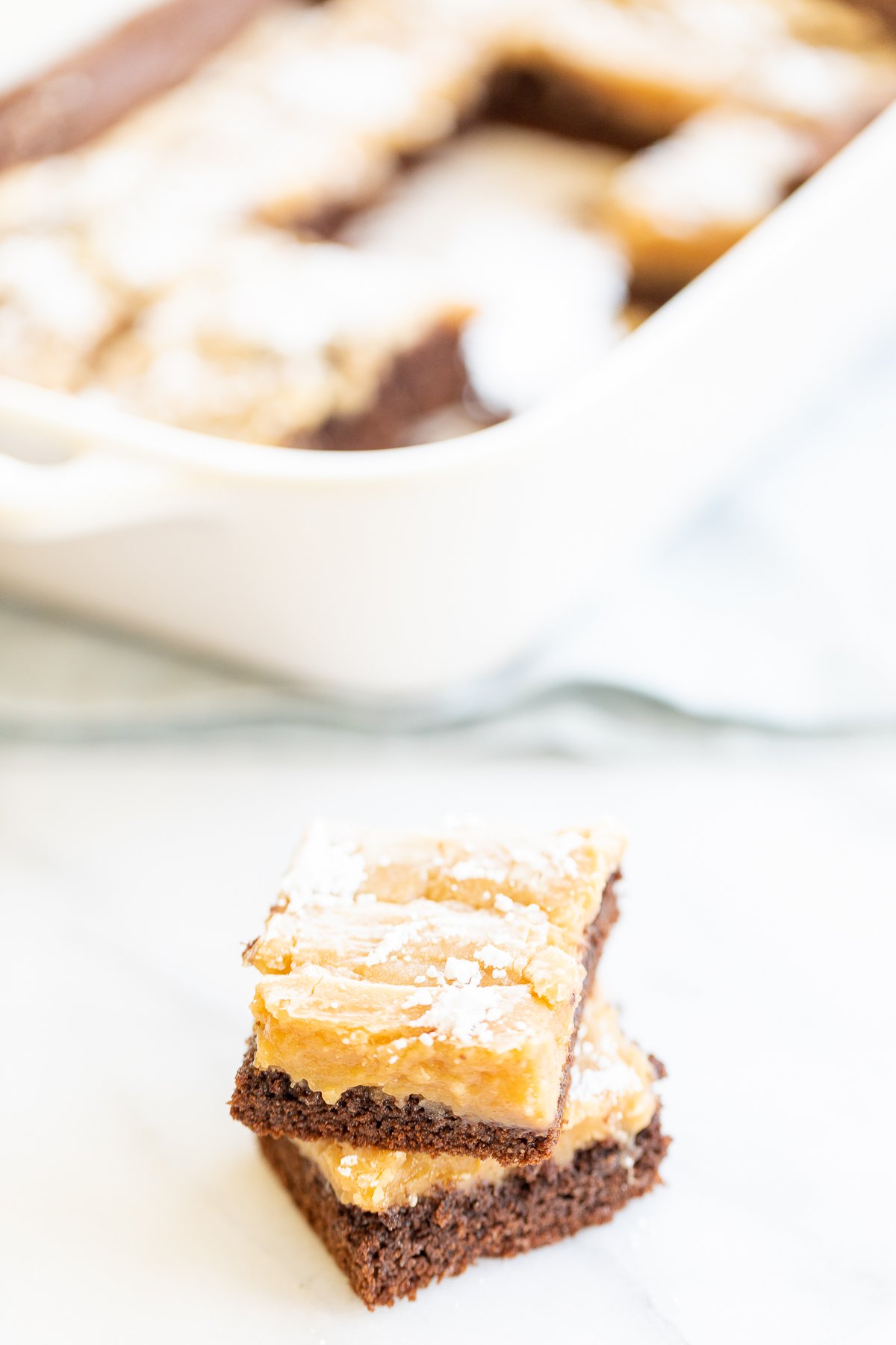 A slice of peanut butter ooey gooey butter cake.