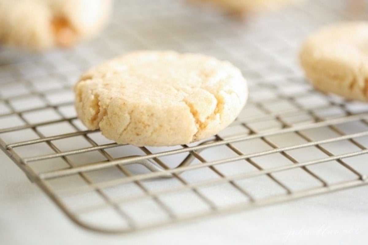 Cheesecake cookies on a wire cooling rack