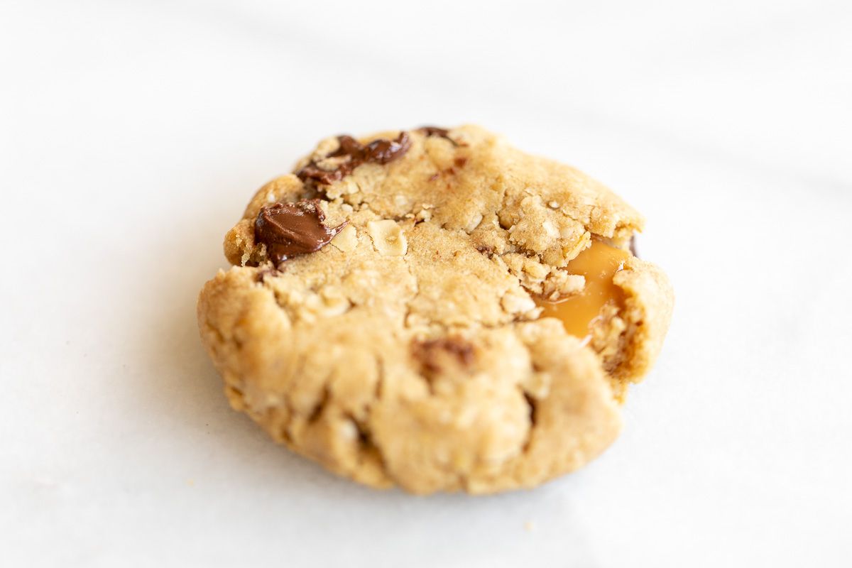 A carmelita cookie on a white marble surface.