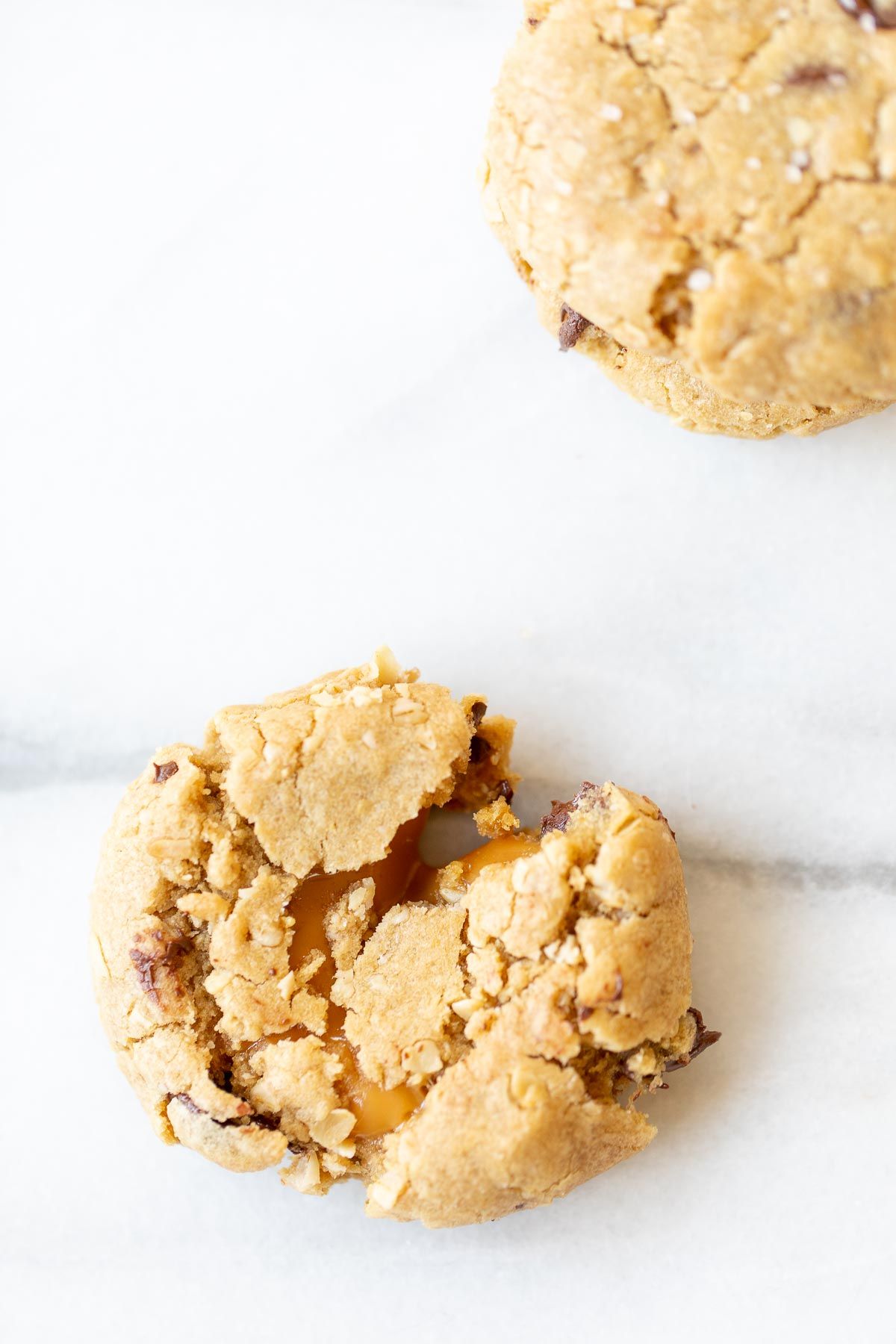 A carmelita cookie on a white marble surface.