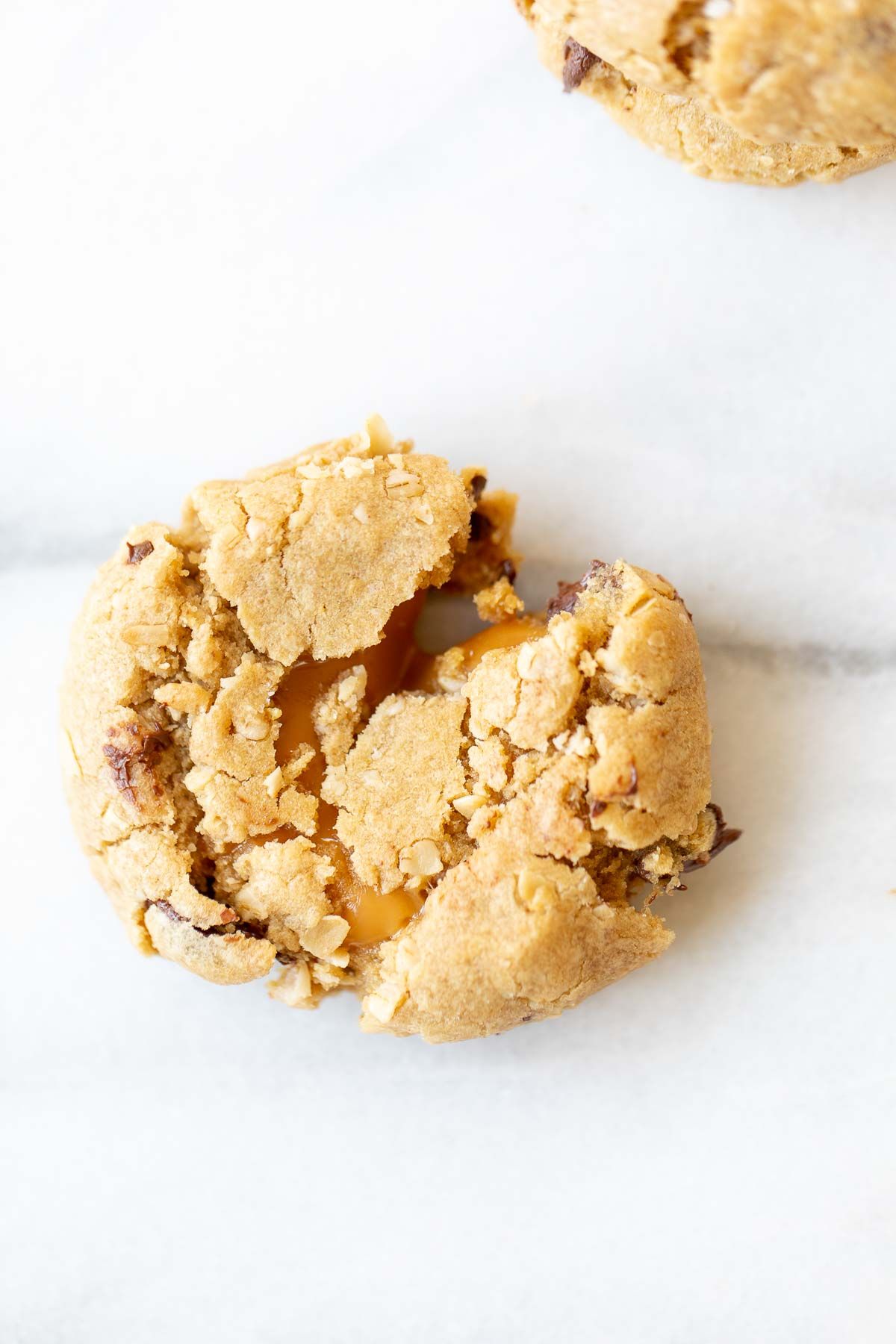 A carmelita cookie on a white marble surface.