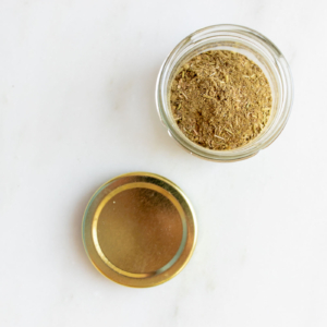 chicken seasoning in a jar with lid off