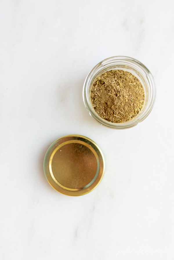 chicken seasoning in a jar with lid off