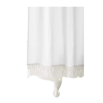 a fringed shower curtain for a nautical bathroom