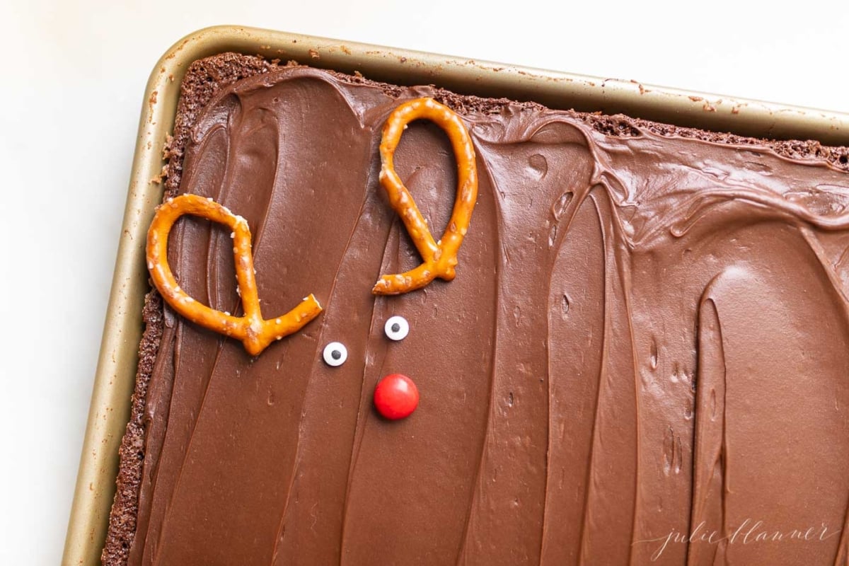 Christmas brownies with pretzels shaped into reindeer.