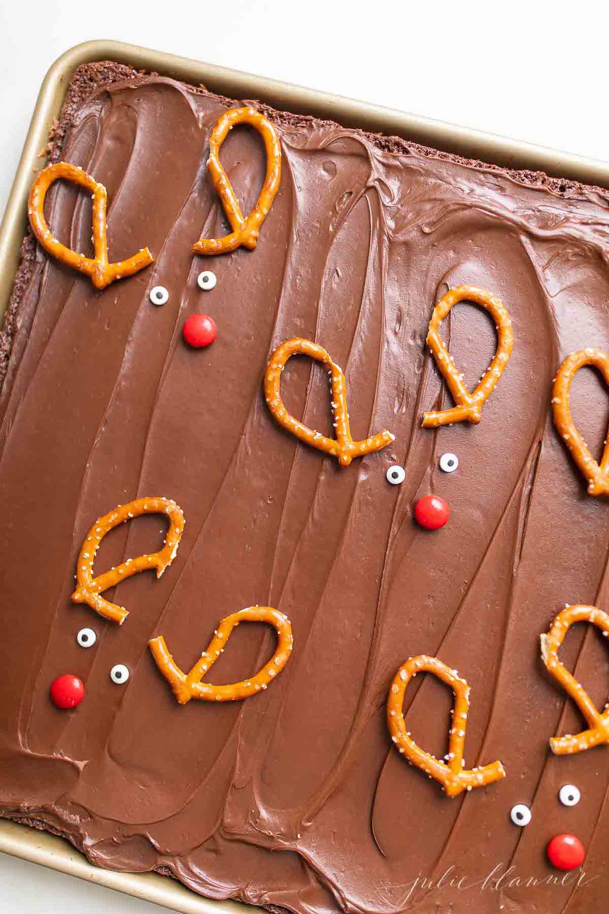 Christmas brownies with pretzels shaped into reindeer.