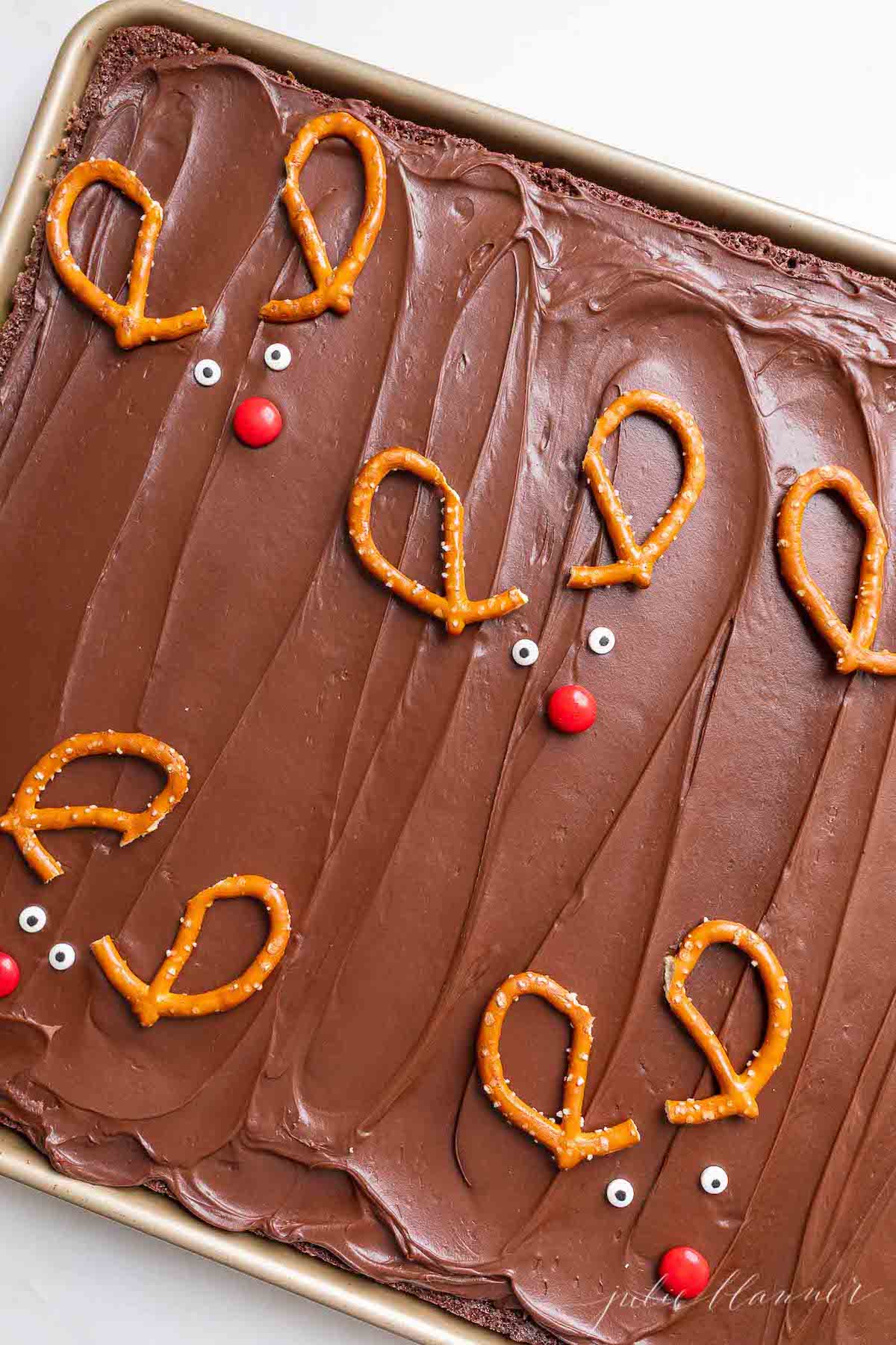 Christmas brownies with pretzels shaped into reindeer.