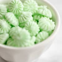 A bowl of green candies