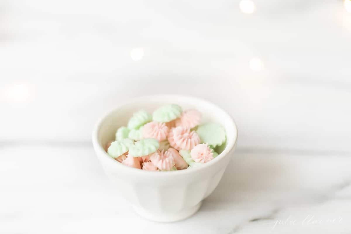 Cream cheese mints served in a white bowl